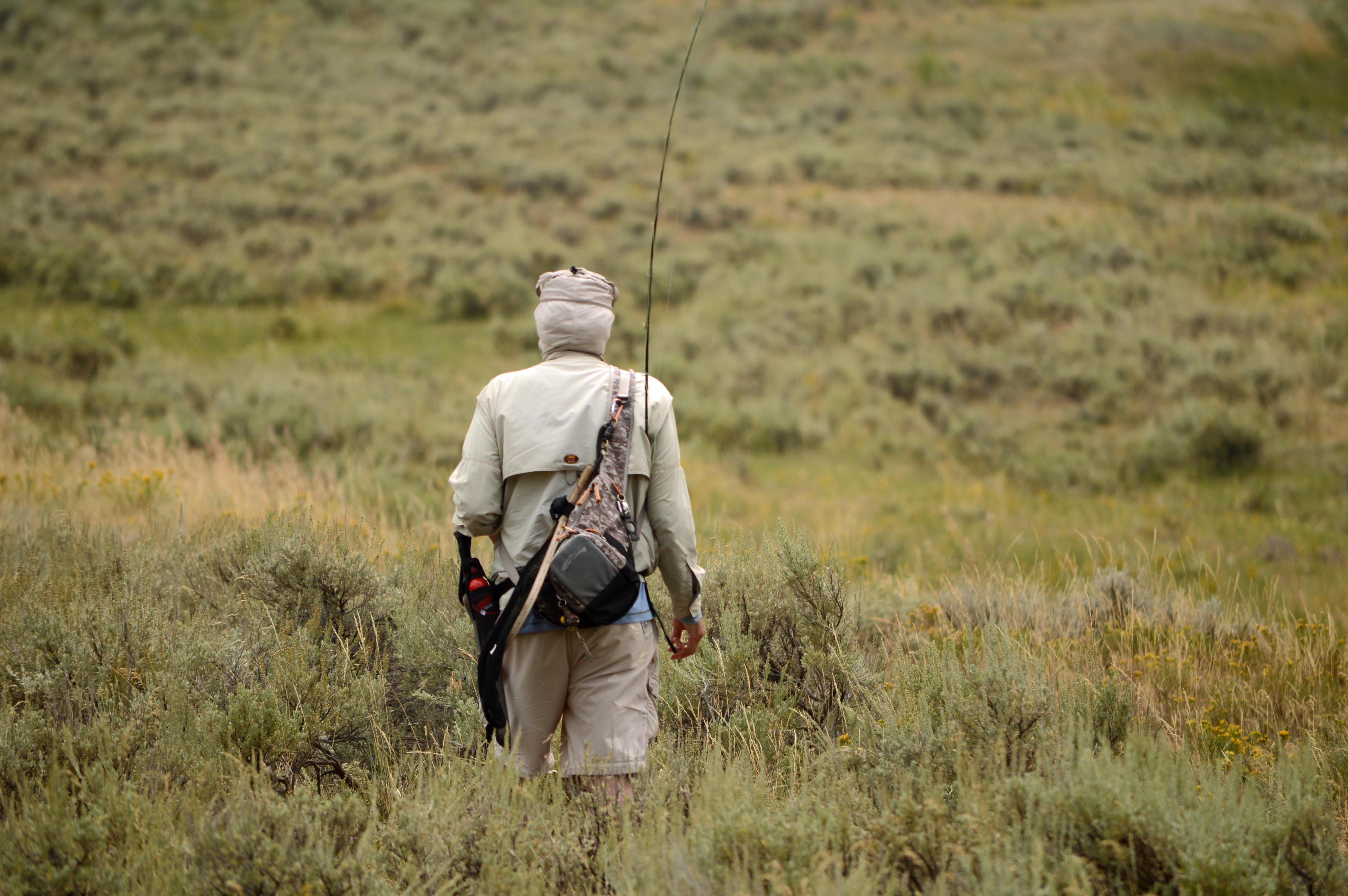 Yellowstone National Park Visitors Guide Fisherman